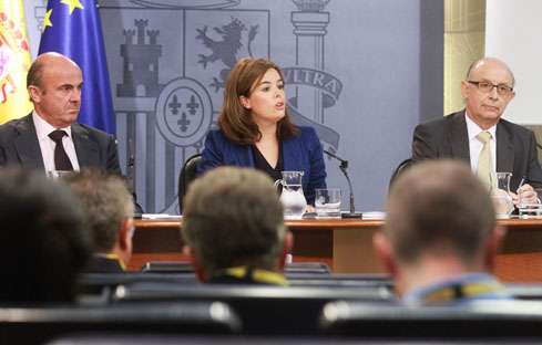 Imagen de Luis de Guindos, Soraya Saenz de Santamaria, y Cristobal Montoro