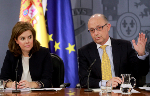 Imagen de Soraya Saenz de Santamaria y Cristobal Montoro