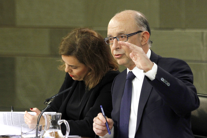 Imagen de Cristobal Montoro y Soraya Sáenz de Santamaría