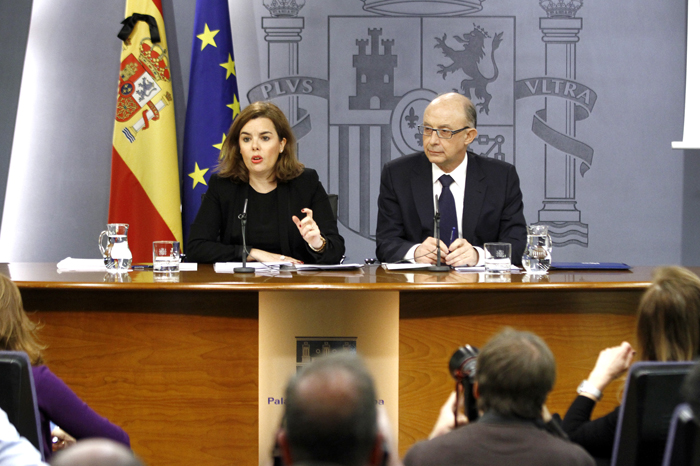 Imagen de Cristobal Montoro y Soraya Sáenz de Santamaría